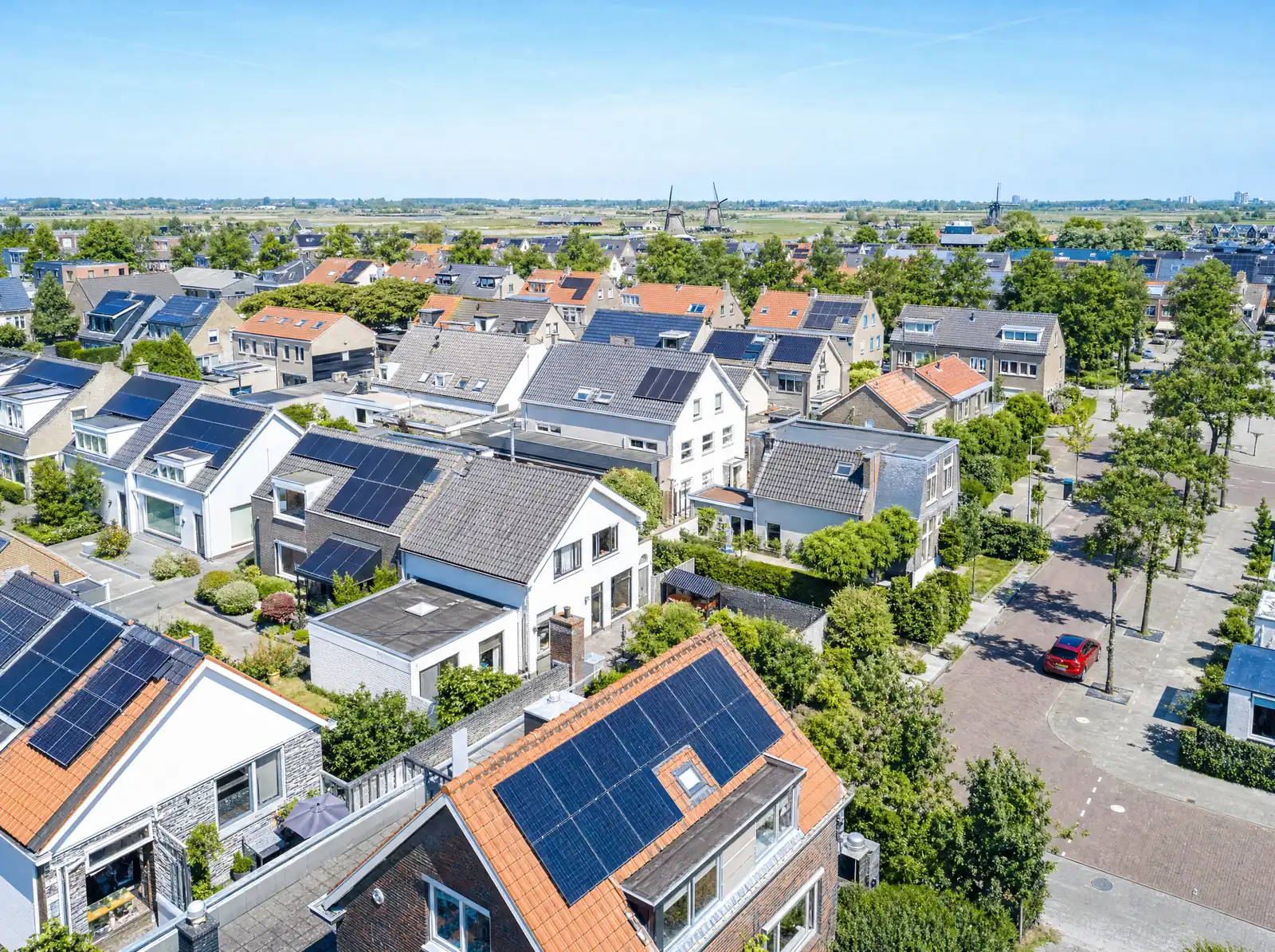 Rooftops with solar panels in a Dutch residential neighbourhood